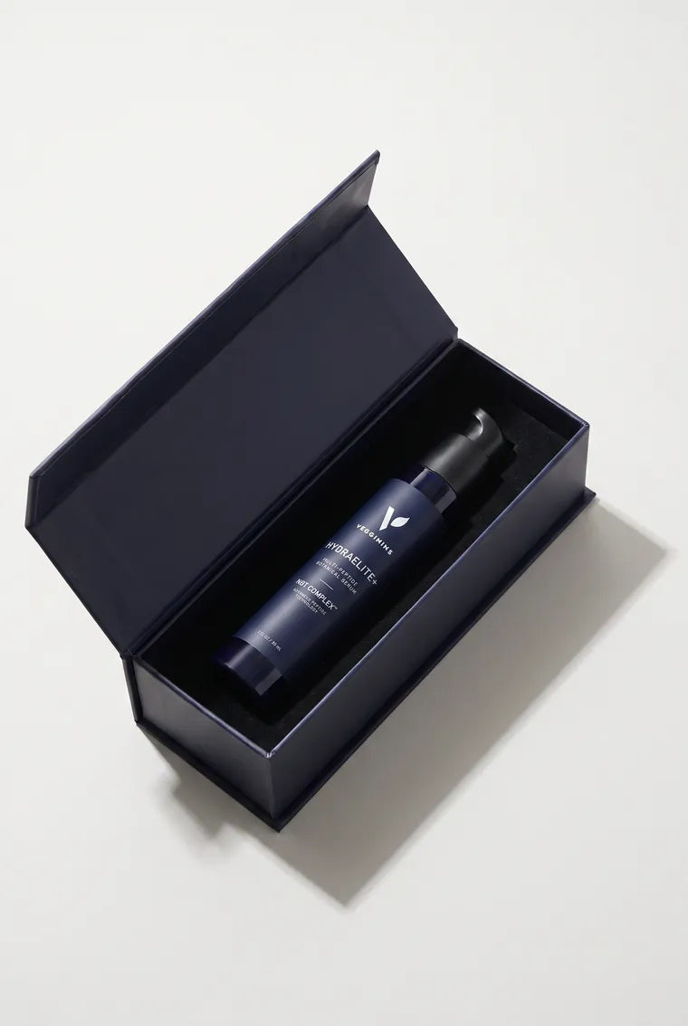 The open box with the HydraElite+ bottle seated in the foam insert